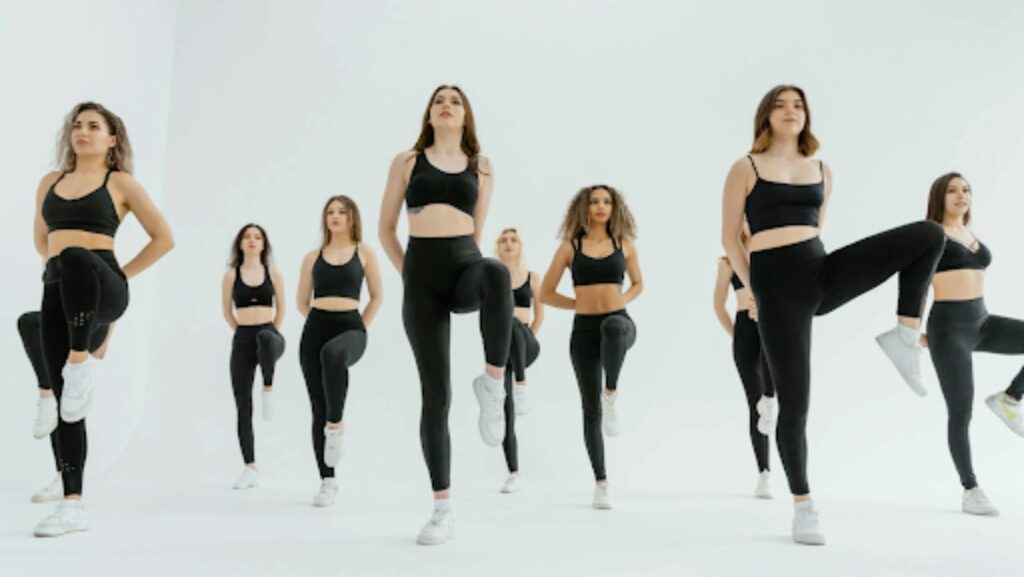 women dancing on a white background